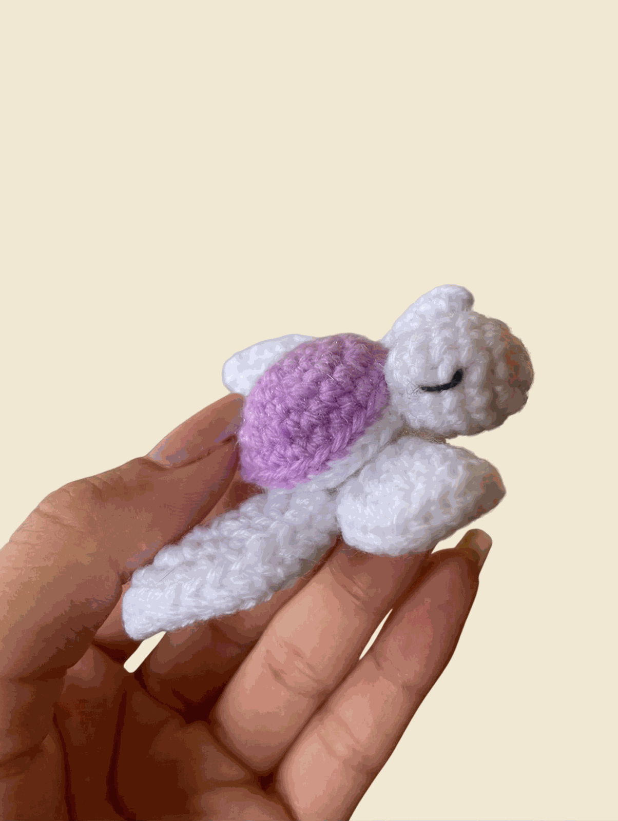 Crochet turtle with a purple shell